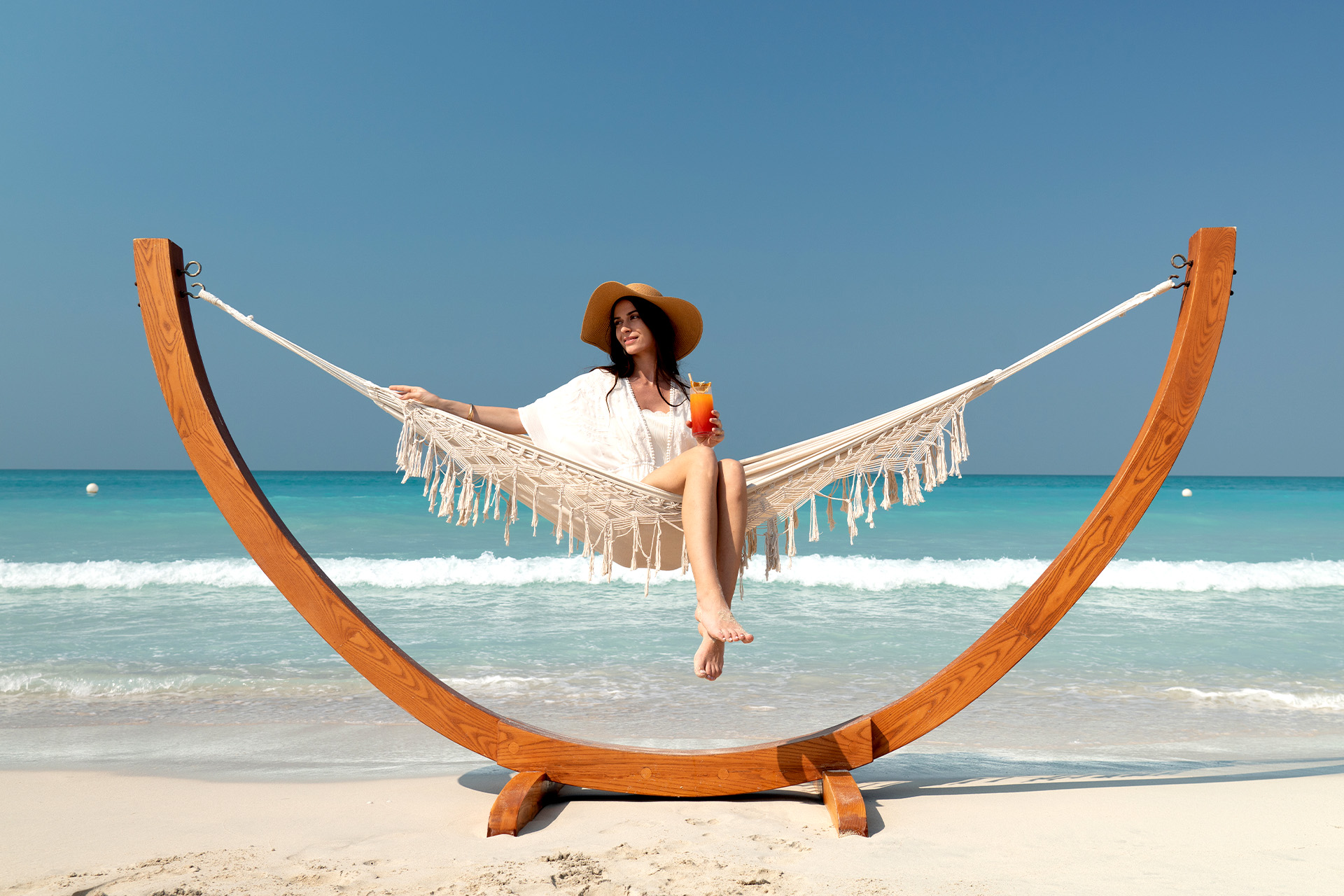 Woman along the beach of Abu Dhabi